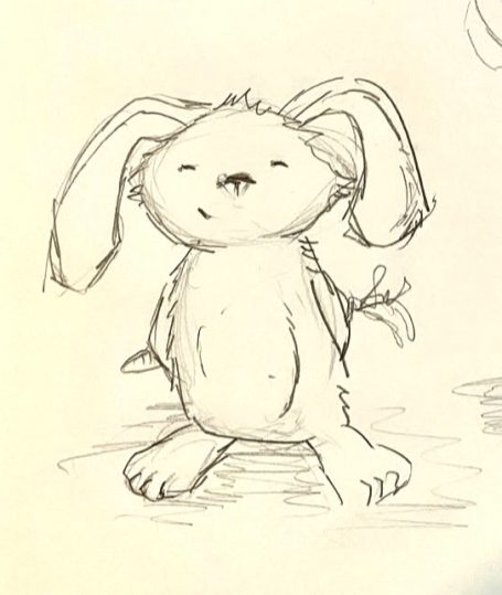 Ein niedlicher, lächelnder Hase mit langen Ohren und einem runden Körper.
